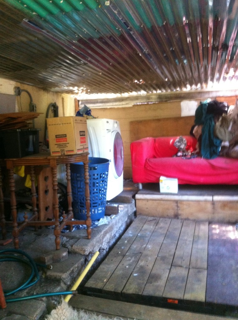 Improvised laundry area under the deck